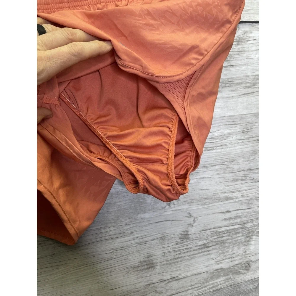 Nike Dri-FIT Running Shorts Womens Large Orange‎ Split Hem Lined Athletic Track